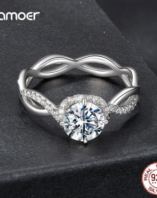 BAMOER 925 Sterling Silver Twist Solitaire Ring with 1CT Moissanite Diamond and Tiny Pave Set CZs
