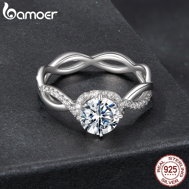 BAMOER 925 Sterling Silver Twist Solitaire Ring with 1CT Moissanite Diamond and Tiny Pave Set CZs
