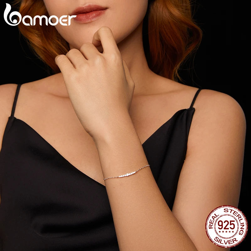 BAMOER - 7 Glittering Moissanite Diamonds Adorn this Sterling Silver Chain Bracelet, Plated with White Gold