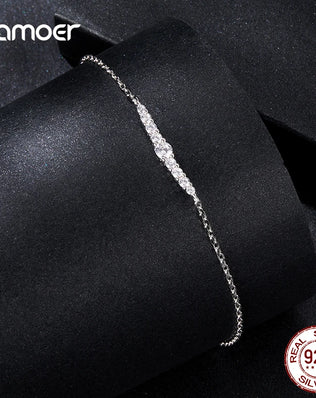 BAMOER - 7 Glittering Moissanite Diamonds Adorn this Sterling Silver Chain Bracelet, Plated with White Gold