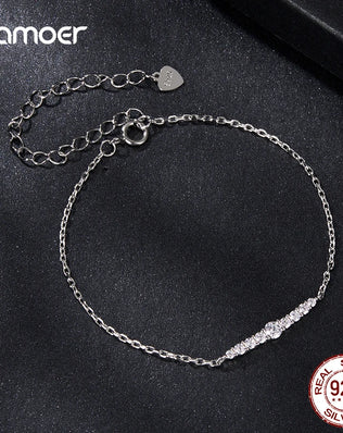 BAMOER - 7 Glittering Moissanite Diamonds Adorn this Sterling Silver Chain Bracelet, Plated with White Gold